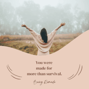 Woman raising her hands in praise in field in the morning. <yoastmark class=